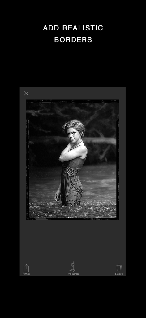 A black and white portrait featuring a realistic vintage film border within the Darkr app interface.