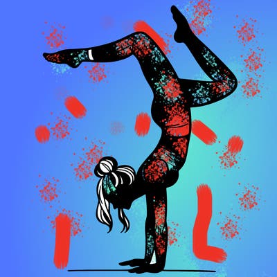 a woman doing a handstand