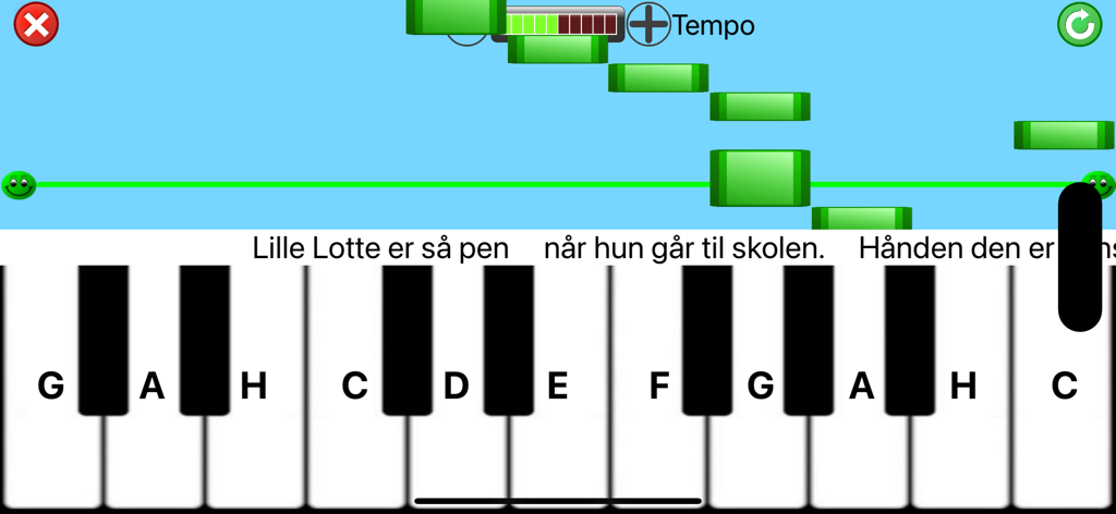 Kids piano app interface showing falling green tiles and lettered keys with lyrics