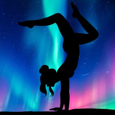 a woman doing a handstand