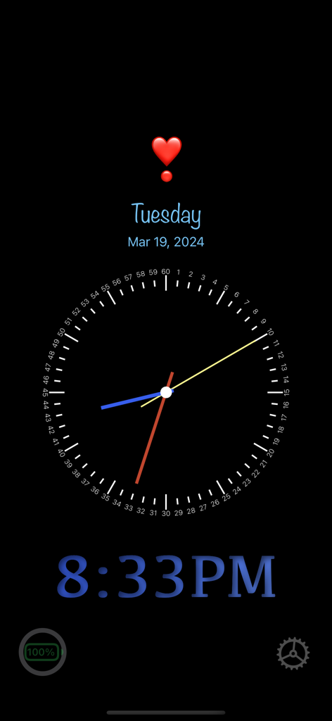 Always On Display - Interfaz de Always On Display con reloj analógico y digital personalizado con un emoji de corazón rojo e indicador de batería.