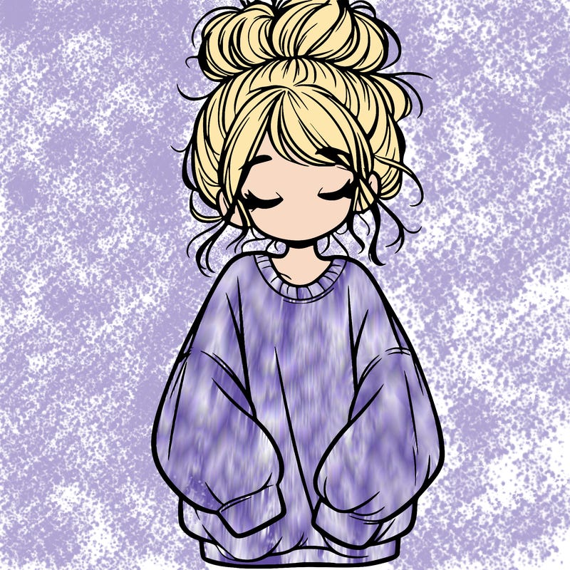 girl with baggy sweatshirt and messy bun
