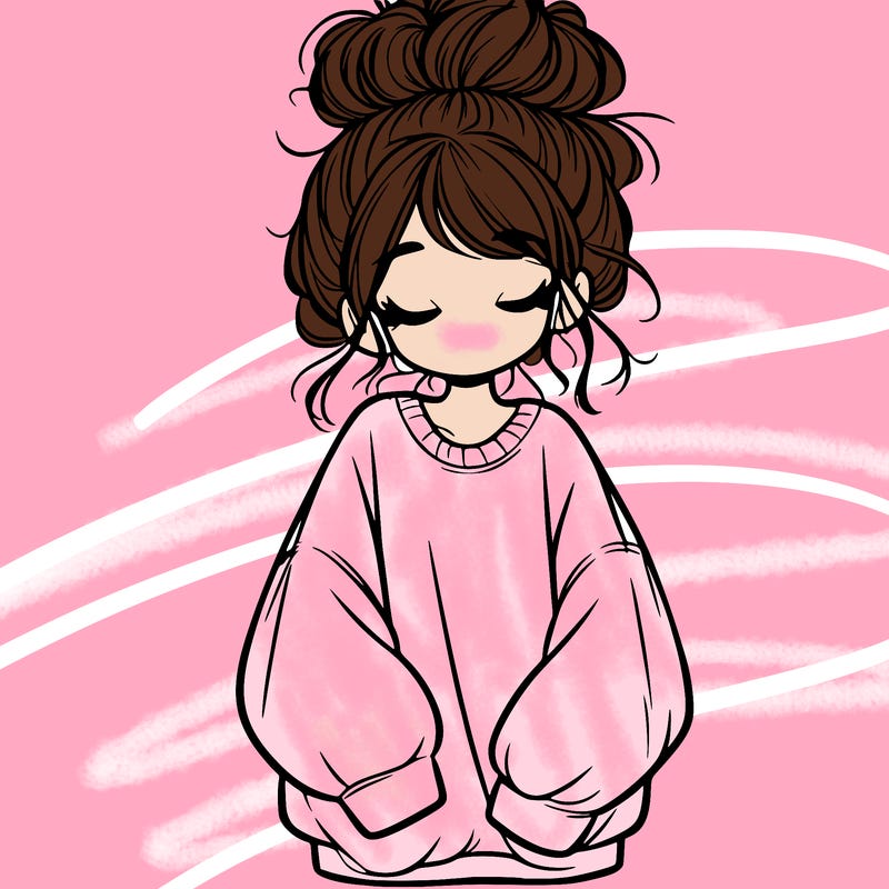 girl with baggy sweatshirt and messy bun
