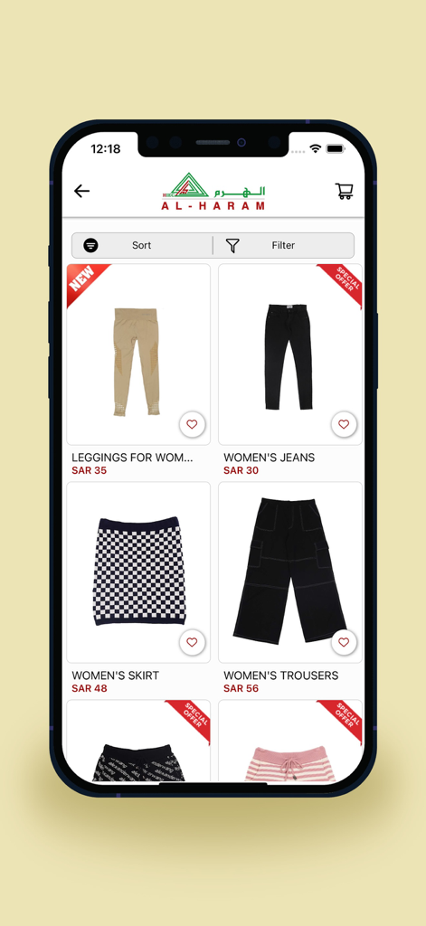Alharamstores mobile app screen displaying a variety of women's apparel including leggings, jeans, and skirts with sorting and filtering options.