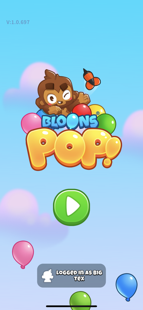 Bloons Pop! - Pantalla de inicio del juego móvil Bloons Pop con un mono lindo sobre una pila de globos coloridos y un gran botón de reproducción verde.