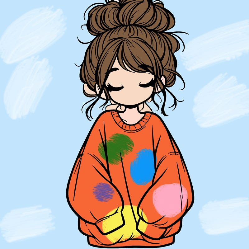 girl with baggy sweatshirt and messy bun