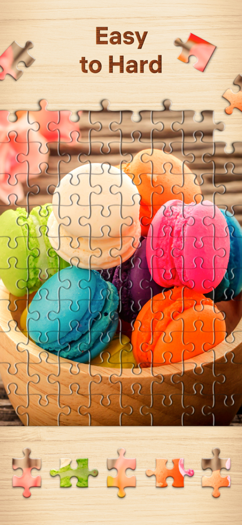 A jigsaw puzzle featuring colorful macarons in a wooden bowl illustrating the range of difficulty levels from easy to hard.