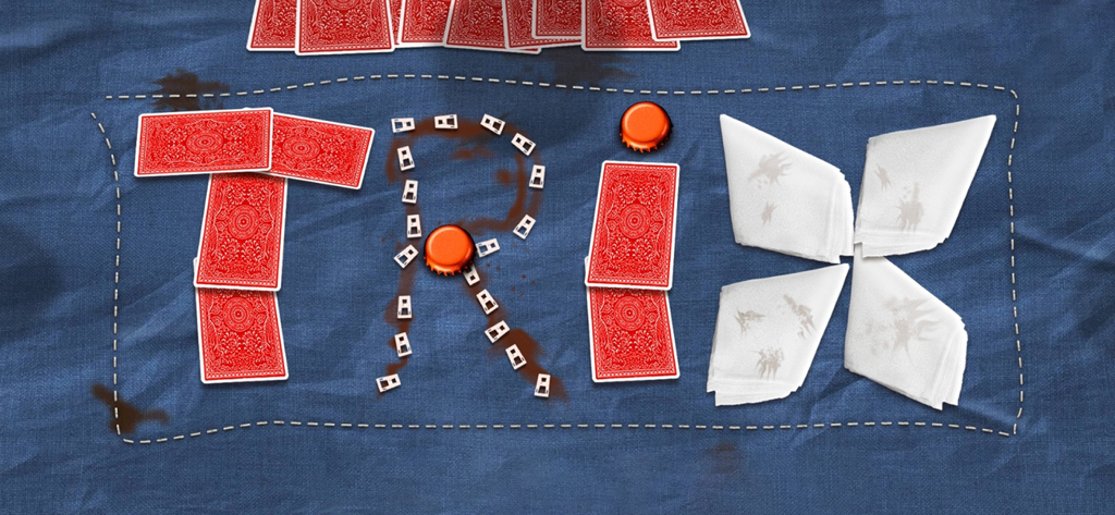 Trix:#1 Card Game Middle East - 青いテクスチャの背景に、トランプ、ナプキン、ボトルキャップを使ってクリエイティブに綴られた「TRIX」という文字