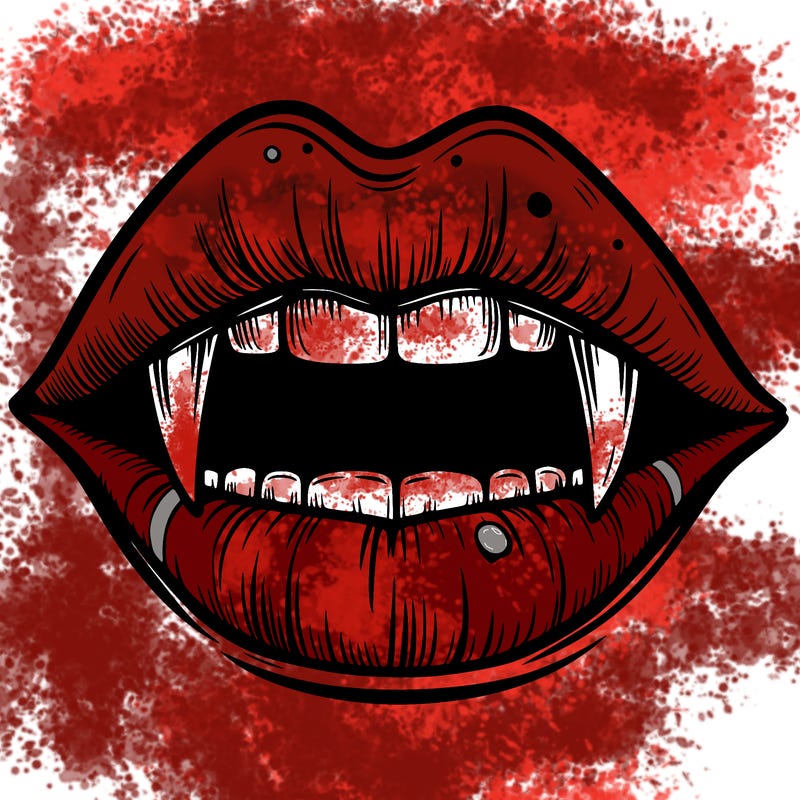 lips with vampire teeth