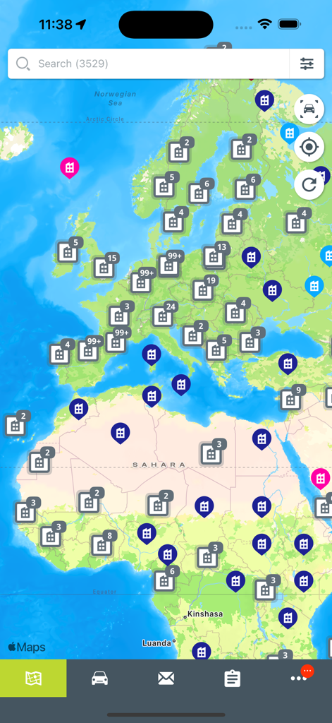 Webfleet Mobile - Webfleet Mobile app interface showing a real-time global map with fleet vehicle locations and asset clusters.