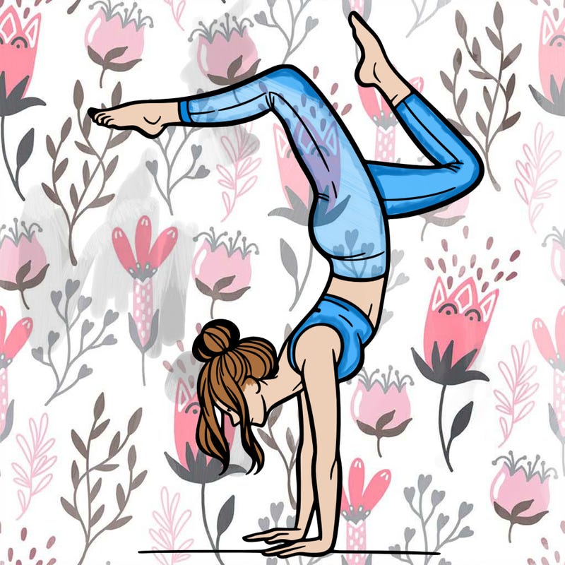 a woman doing a handstand