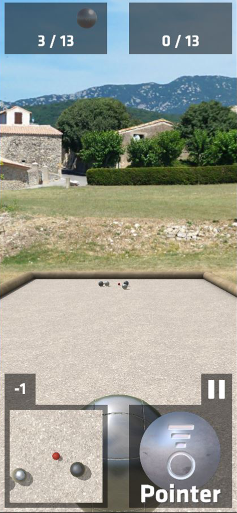 La pétanque - A match in the La petanque mobile game showing boules on a gravel court with a scenic village background.