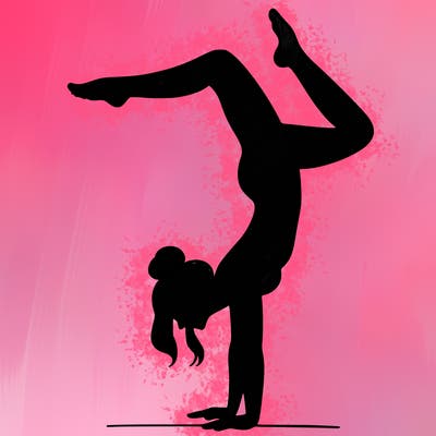a woman doing a handstand