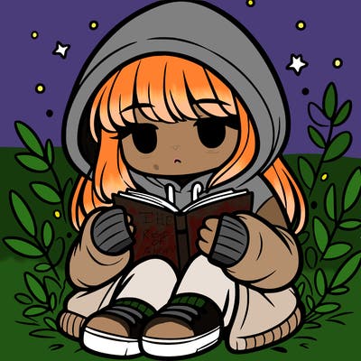 girl in oversized hoodie reading a book