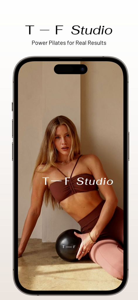 TF Studio app splash screen featuring a woman with a fitness ball and the text Power Pilates for Real Results