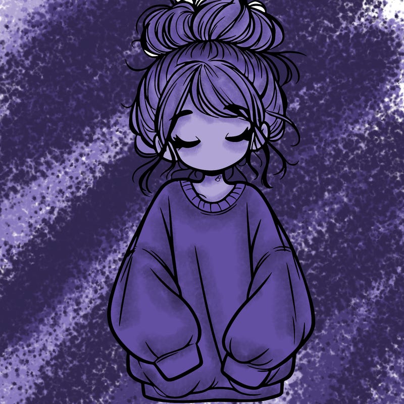girl with baggy sweatshirt and messy bun