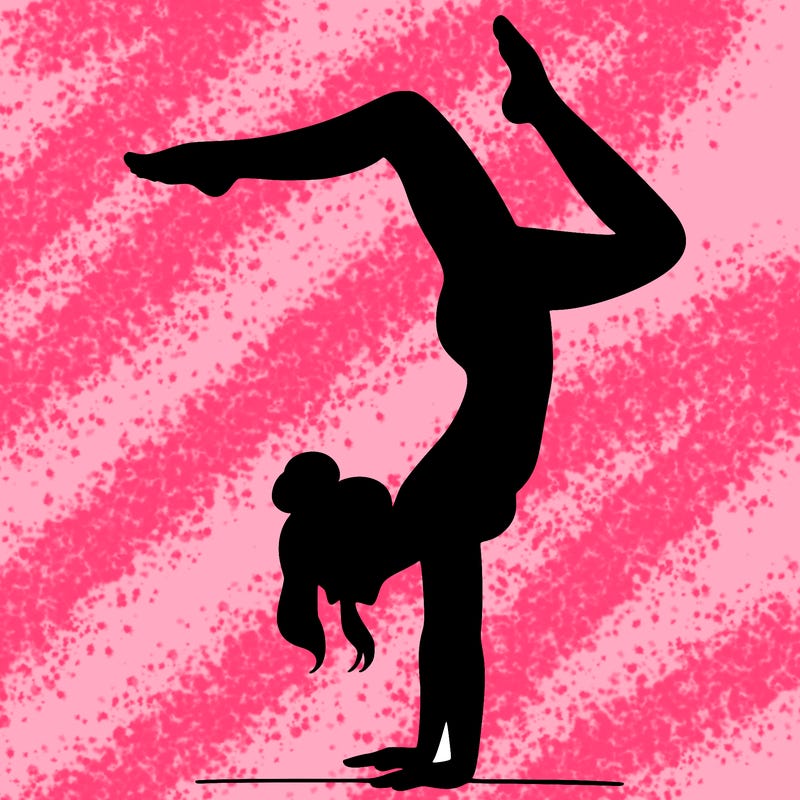 a woman doing a handstand
