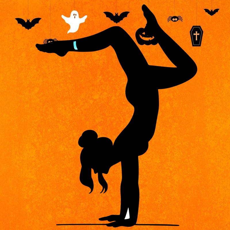 a woman doing a handstand