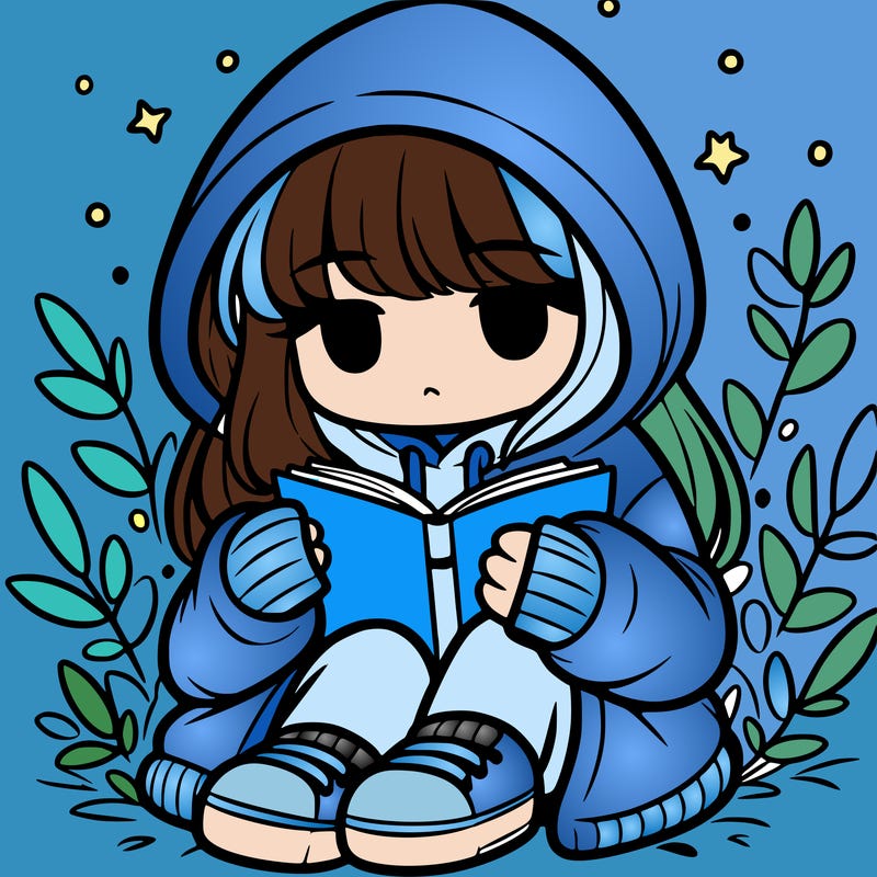 girl in oversized hoodie reading a book