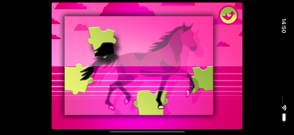 A child playing a horse puzzle game with green pieces on a pink background