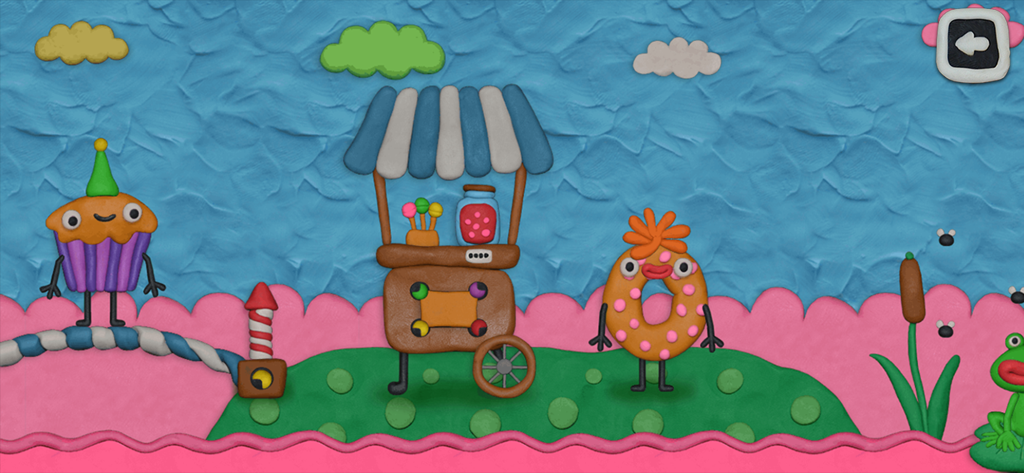 Un nivel colorido de plastilina con un carrito de dulces y lindos personajes de cupcakes y donas