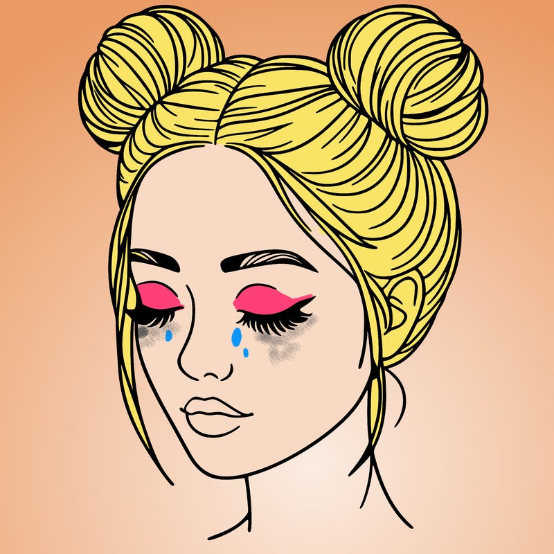 woman with hair buns