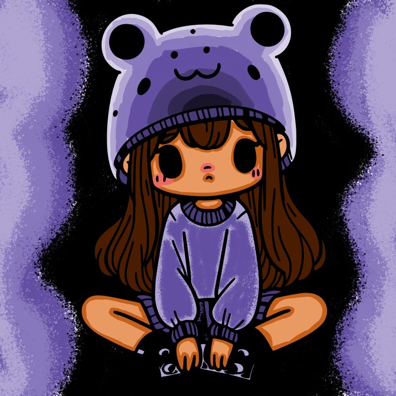 a girl wearing a frog hat and some frog socks