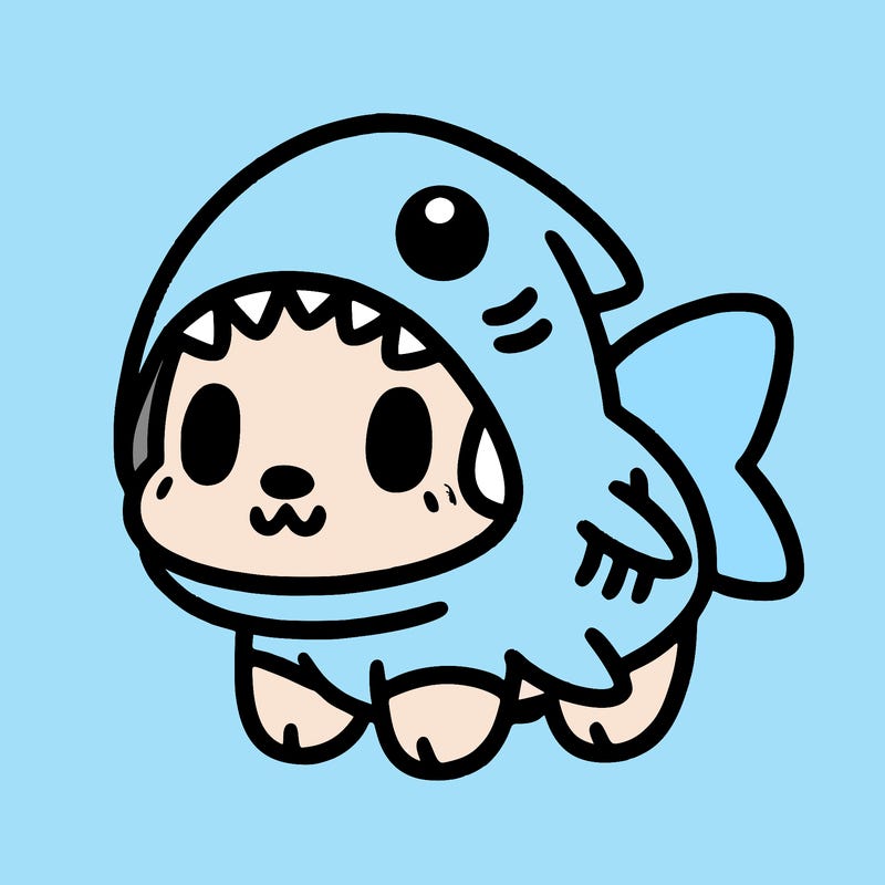 cute dog wearing a shark costume