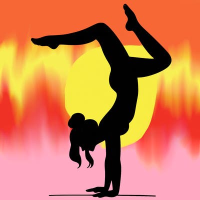 a woman doing a handstand