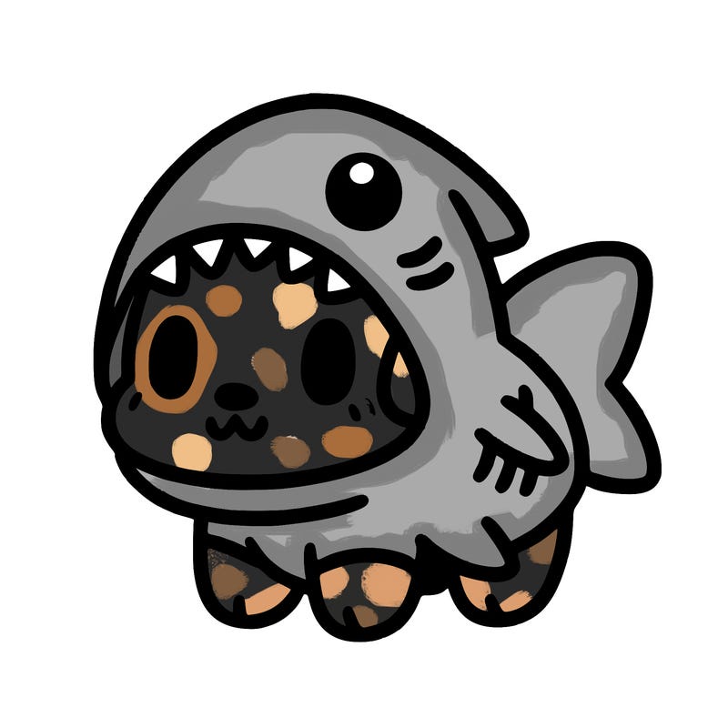 cute dog wearing a shark costume