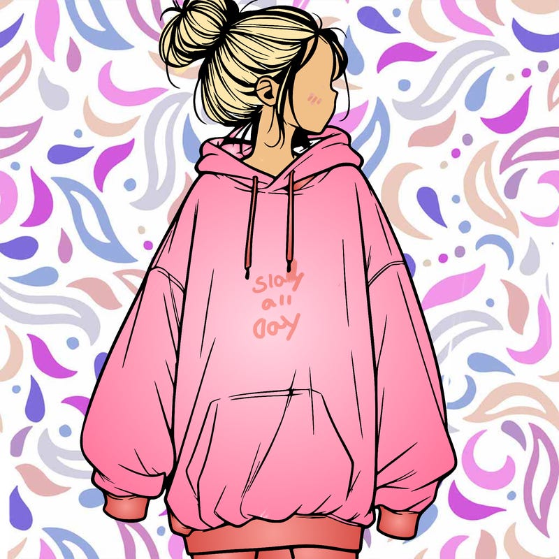 realistic girl with a oversized sweatshirt on and a bun