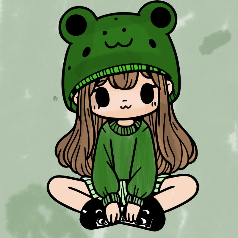 a girl wearing a frog hat and some frog socks