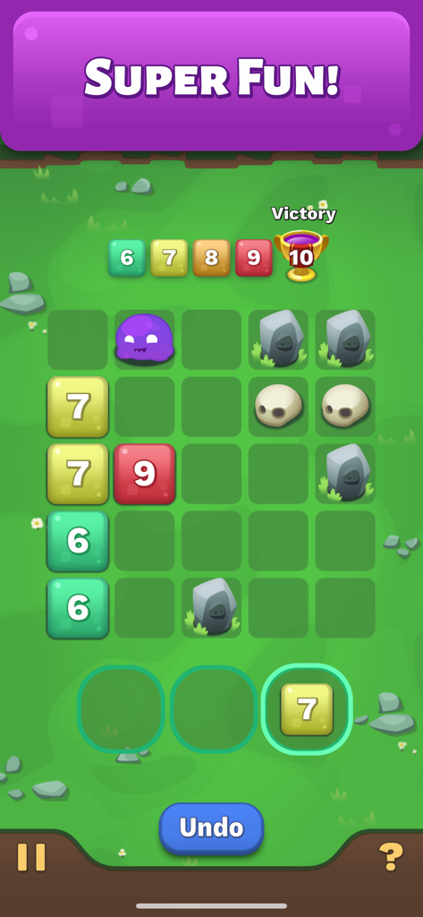 Écran de jeu de Merge Cube Skill Practice montrant des tuiles numérotées et des monstres sur une grille