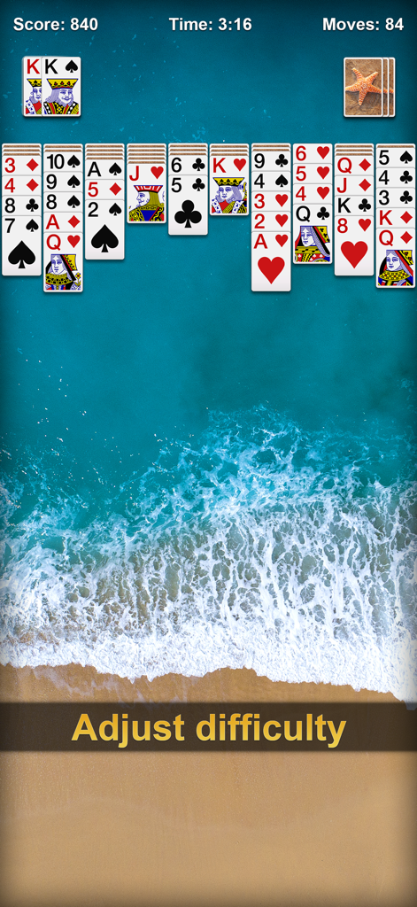 Spider Solitaire game interface featuring a beach background and the text adjust difficulty.