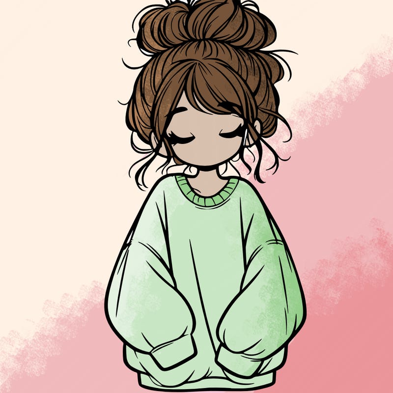 girl with baggy sweatshirt and messy bun