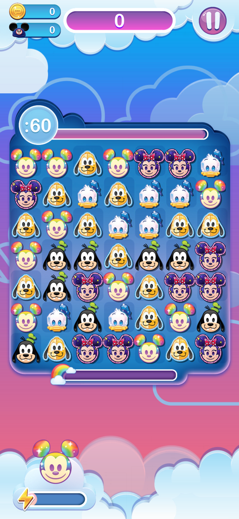 A match 3 puzzle board featuring Disney character emojis like Mickey Mouse Minnie Mouse and Pluto