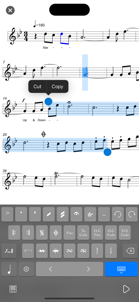 Composer Pro - Score Creator - A mobile music notation interface showing sheet music editing with a specialized musical symbol keyboard