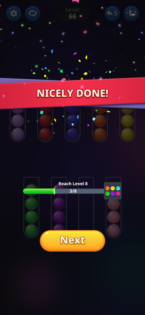 Ball Sort Puzzle: Color Bubble - A celebratory level complete screen in Ball Sort Puzzle with confetti and sorted color bubbles.