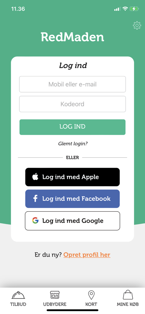 Login screen of the RedMaden mobile app featuring options to sign in via email, Apple, Facebook, or Google.