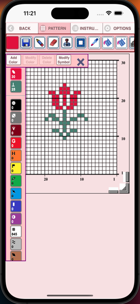 Graphghan Pattern Creator - Interface of the Graphghan Pattern Creator app showing a red flower design on a crochet grid with editing tools