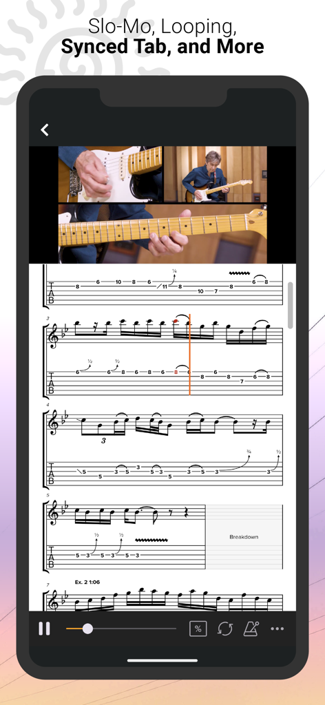 Un vídeo de lección de guitarra reproduciéndose con tablaturas y partituras sincronizadas en la aplicación TrueFire.