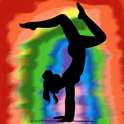 a woman doing a handstand