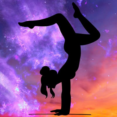 a woman doing a handstand