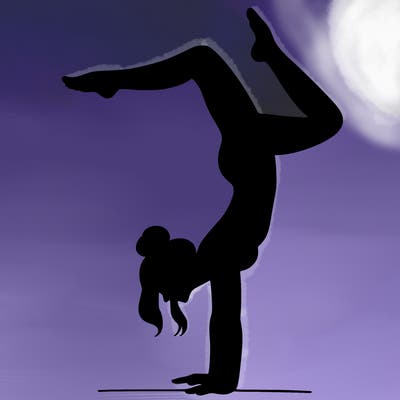 a woman doing a handstand