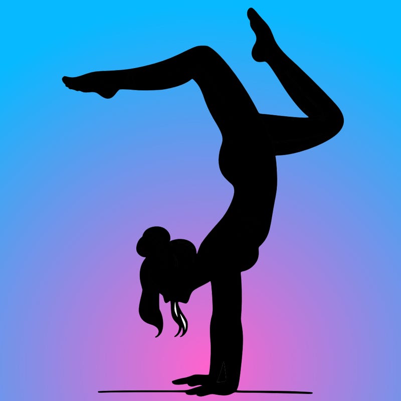a woman doing a handstand