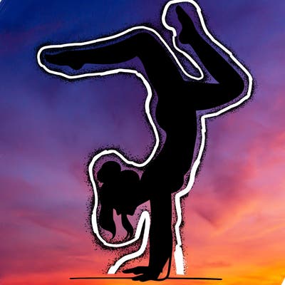 a woman doing a handstand