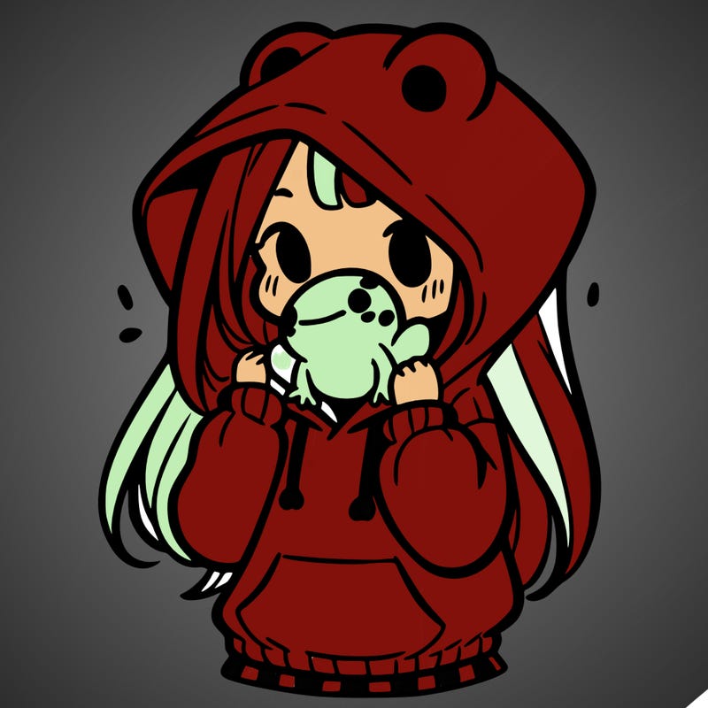 a girl holding a froggy hoodie