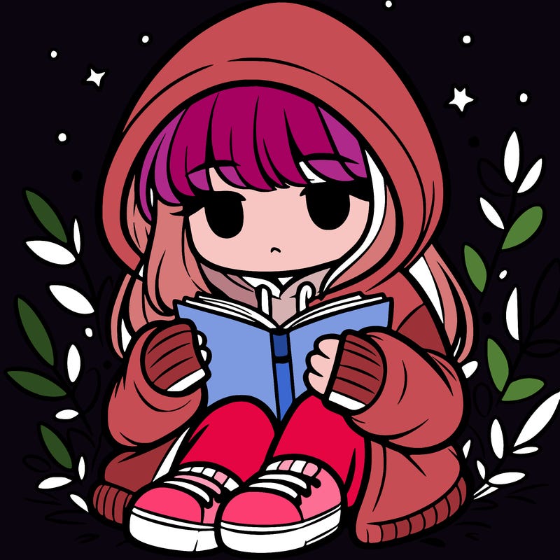 girl in oversized hoodie reading a book