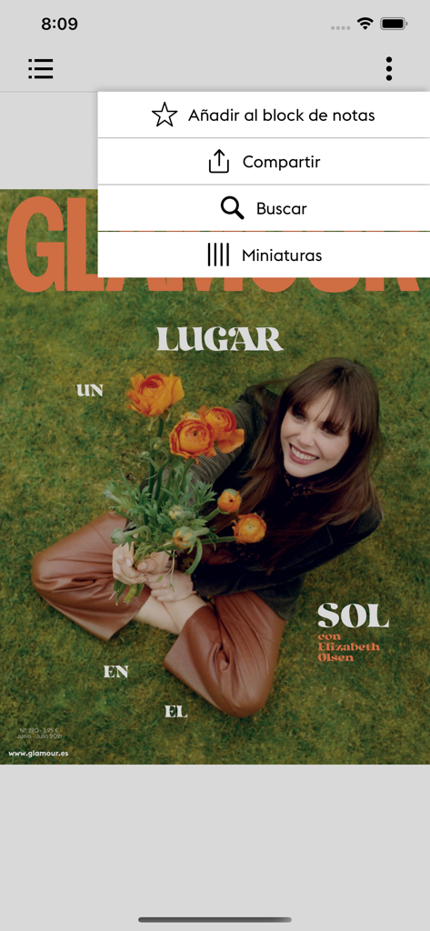 Portada de revista digital de Glamour España con Elizabeth Olsen y un menú de navegación abierto.