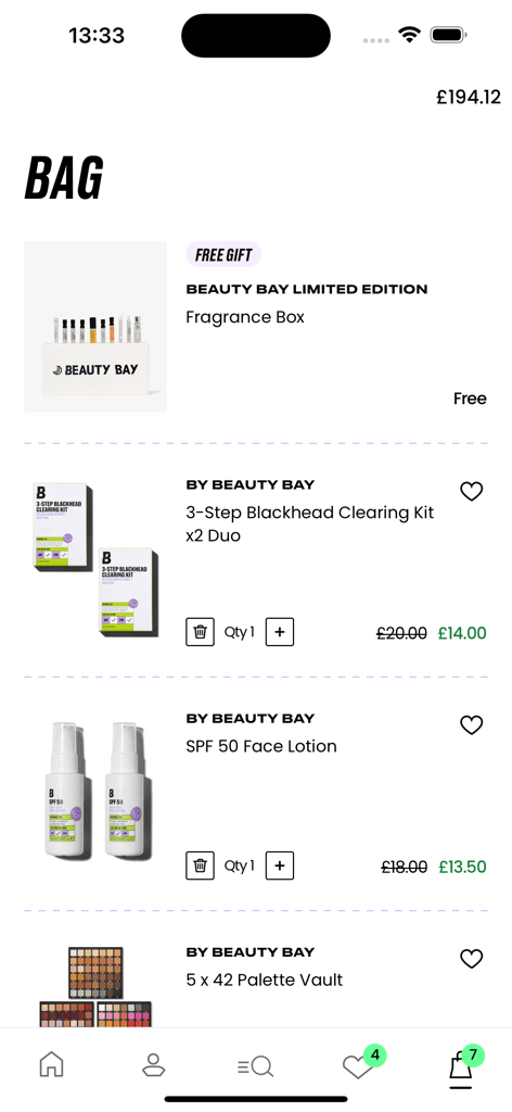 The shopping bag screen of the BEAUTY BAY app displaying selected skincare and makeup products with prices and a free gift.